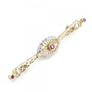 Brooch in 14 K gold with rubies and zircons, 1373.