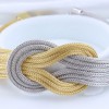 Bracelet in wide knot design, silver, two color, 1572.