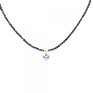 Quartz necklace with zircon heart and silver binding, 1979.