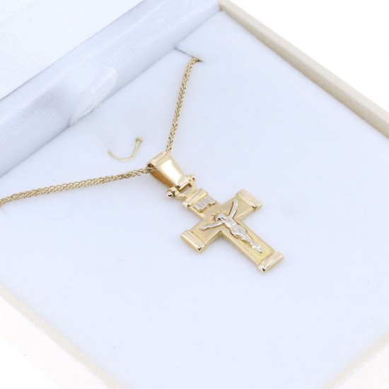 Cross 18 K crucified in yellow and white gold, 2174.