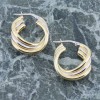 Silver triple hoops in 18mm with twisted design and gold plating, 2595.