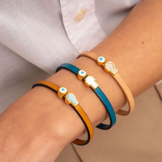 Handmade leather blue bracelet by Excite Fashion Jewellery, with blue raffia strap, metallic gold plated elements, cross-shaped motifs, and enamel eye, BM-1704-01-07-65.
