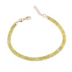 Bracelet in "sock" design with many small white and red zircons, gold plated, 3000.